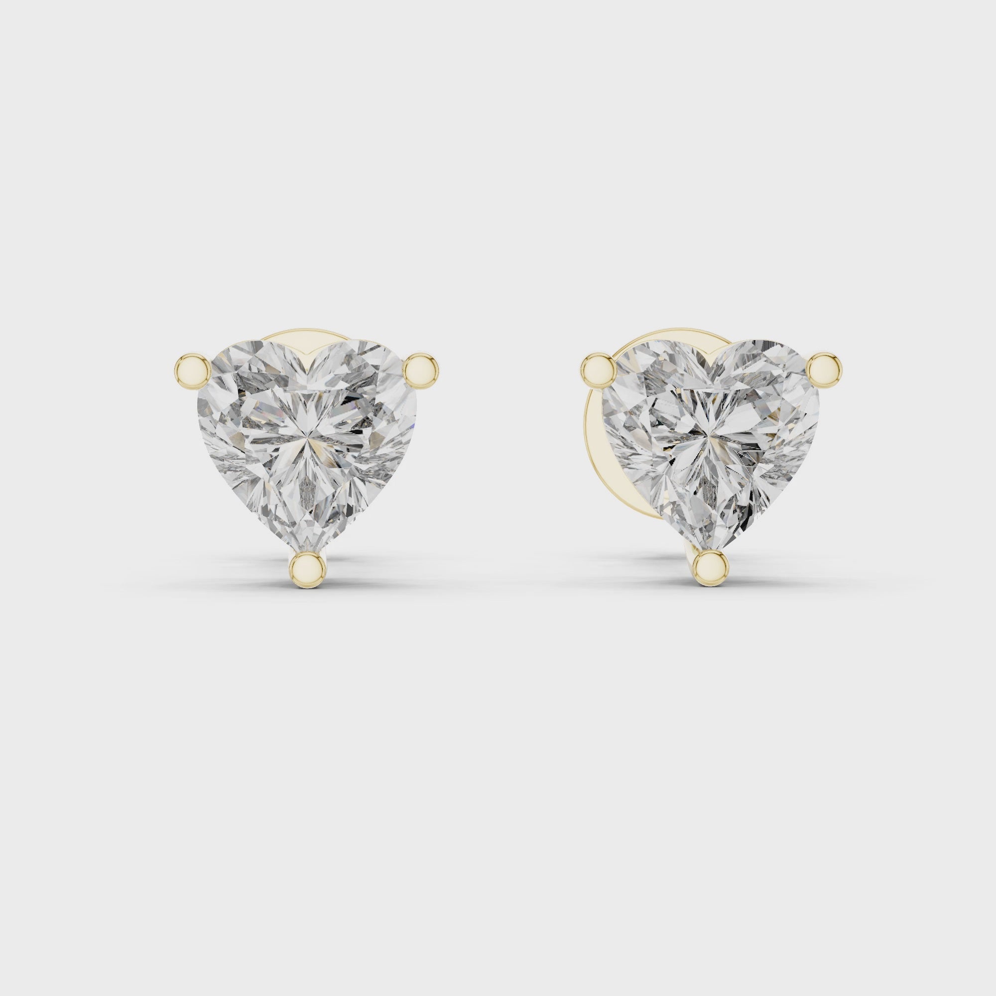 Luminous Heart Embrace Stud Earrings