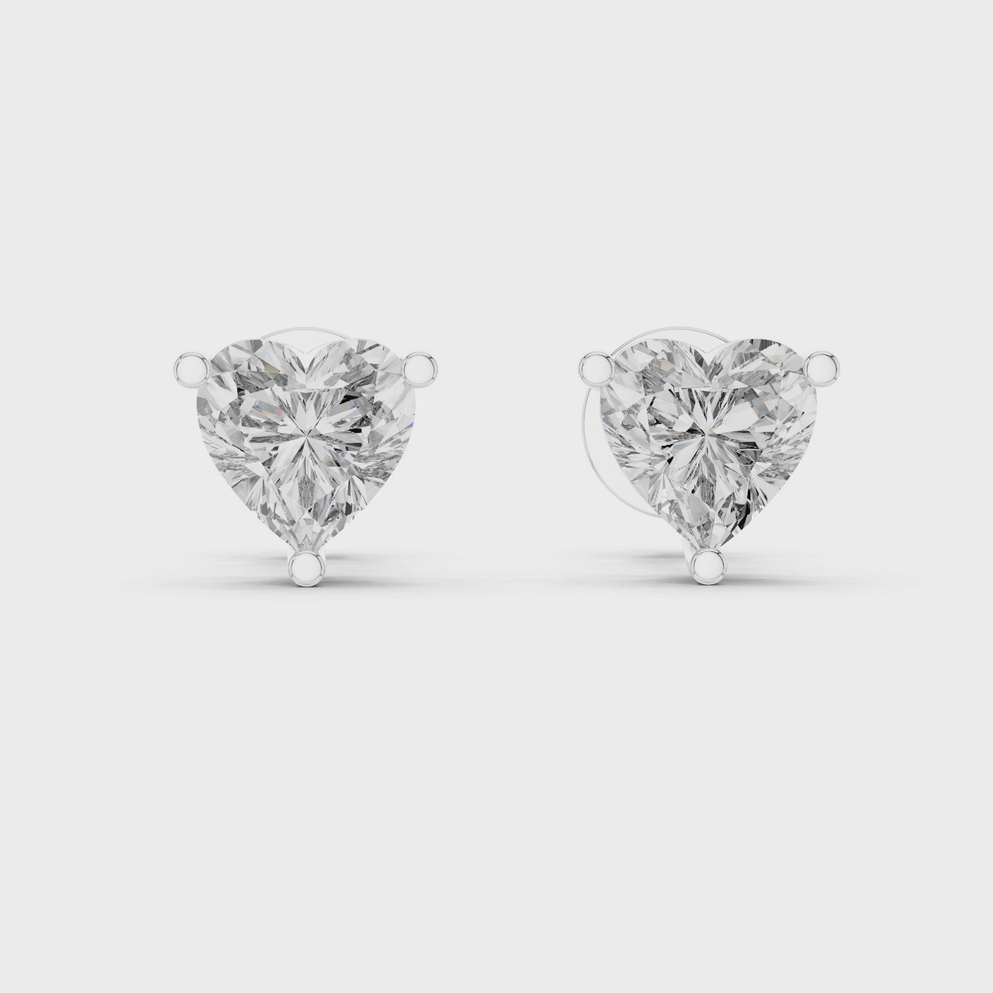 Luminous Heart Embrace Stud Earrings